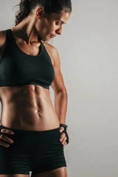 Toning Up at Home: The Ultimate Guide to Bodyweight Exercises 2 Image of woman's toned stomach after bodyweight exercises Twickenham and non-surgical treatment from Lipo 360