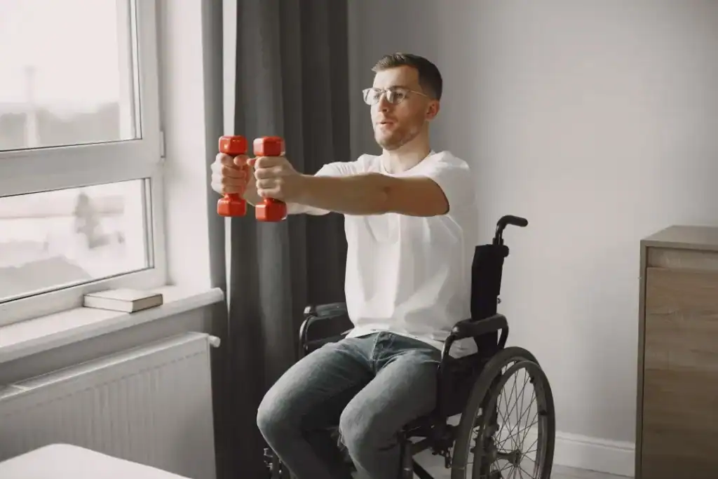 Empowering Weight Loss: A Comprehensive Guide for Individuals with Disabilities 1 Image of man doing exercise in his wheelchair to aid weight loss Twickenham